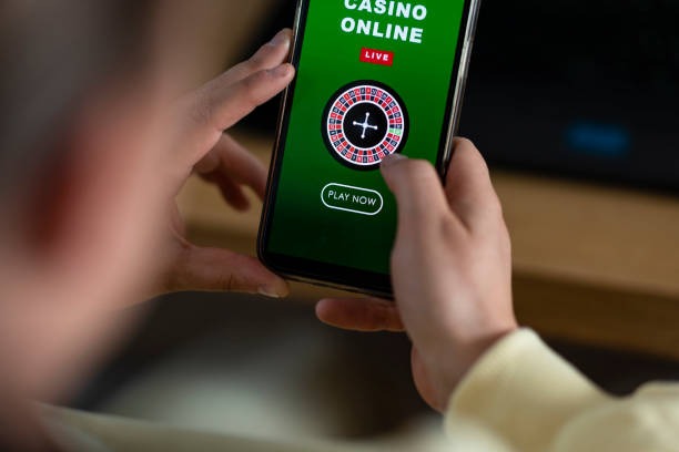 tangki4d platform displayed on mobile showing sports betting, live dealer, and slot game categories